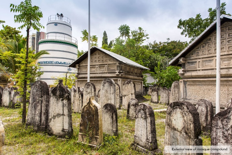 Mosque compound exterior with Munnaaru lighthouse visible